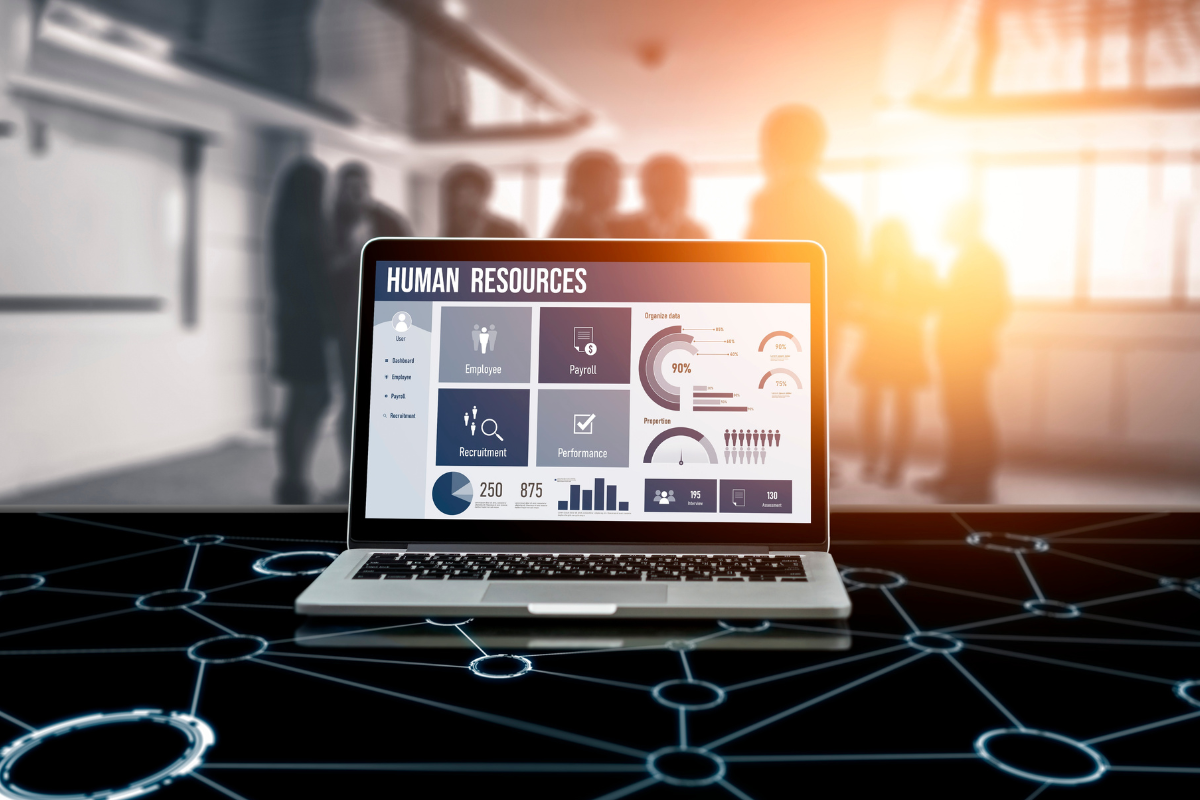 HR manager implementing streamlined processes and automation technology on computer